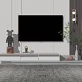 Modern White TV Stand With Flat Screen TV Decorative Items And Green Plant