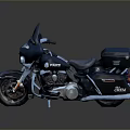 Black Touring Motorcycle With Streamlined Design Rear Storage Compartment And Chrome Accents