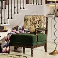 Single Sofa With Green Cushion Floral Backrest Wooden Frame And Colorful Blanket By Side Table