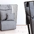 Modern Minimalist Single Sofa with Black Metal Frame Gray Fabric Cushions and Throw Pillows