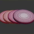 Fresh Red Onion Slices Showing Thin Concentric Red And White Rings Arranged Neatly