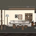 Warm Living Room With Cream Sofa Coffee Tables Floor Lamp Framed Art And Wooden Accents