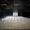 Spacious Modern Conference Room With White Chairs Front Projection Screen Ceiling Lights And Wooden Floor