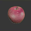 Fresh Pink Apple With White Spots On Black Surface Showing Reflection