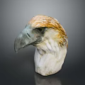 Realistic Eagle Head Sculpture Featuring Yellow And White Feathers With Grey Beak Detail