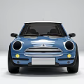 Blue Mini Style Car With Round Headlights White Roof And Front Grille Design
