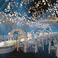 Luxurious Banquet Hall Interior Design With White Petal Ceiling Blue Lighting And Arched Accents
