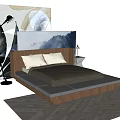 Double Bed with Wooden Headboard White Pillows Dark Bedding Nightstand Table Lamp Abstract Paintings Dark Herringbone Floor