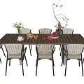 Outdoor Grid Patterned Table With Light Colored Upholstered Chairs And Decorative Vases 3d model