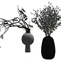 Modern Black Ribbed And White Round Vases With Green Foliage And Twigs Decor