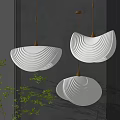 Modern White Pendant Lights With Wavy Texture And Gold Accents In Indoor Space With Plants