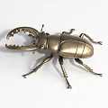 Golden Metallic Beetle Landscape Sculpture With Large Pincers And Realistic Exterior Design