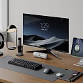 Modern Computer Workstation Setup With Monitor Keyboard Mouse Headphones And Desk Accessories