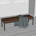 Brown Leather Stitched Bench With Gray Blanket And Black Metal Legs In Modern Interior