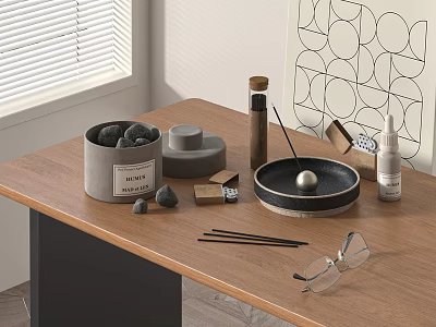 Decorative Ornament Set With Black Stones Gray Cylindrical Box And Silver Ball On Wooden Tabletop 3d model