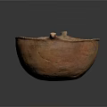 Handmade Brown Clay Bowl With Two Handles Displayed On Black Reflective Surface