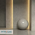 Gray Spherical Component In Modern Space With Textured Walls And Warm Lighting