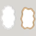 White and Gold Scalloped Edge Mirrors Hanging on Wall with Abstract Paintings and Wooden Floor