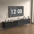 Modern Black TV Stand With Drawers And Decorative Vases On Wooden Floor