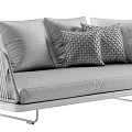 Stylish Outdoor Sofa With Gray Upholstery Blue Pillows Woven Details And Wooden Base