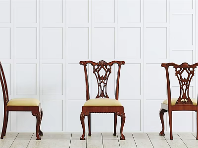 Classic Wooden Dining Chairs With Carved Backrest And Beige Cushioned Seats Against White Paneled Wall 3d model