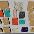 Assorted Colorful Paper Shopping Bags With Handles And Diverse Patterns