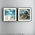 Two Blue And White Abstract Landscape Paintings In Black Frames Hanging On Wall 3d model