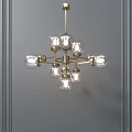 Elegant Modern Chandelier with Brass Frame and Glass Globe Bulbs Hanging in Gray Wall Interior