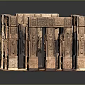 Ancient Carved Stone Architectural Components with Intricate Reliefs and Column Structures