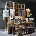 Retail Display Shelves With Mannequins Clothing Bags Shoes And Decorative Flowers