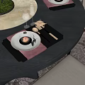 Elegant Dinnerware Set With Red Napkins White Plates And Metal Cutlery On Black Dining Table