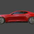 White Sports Car With Sleek Aerodynamic Body And Black Accent Alloy Wheels