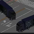 Two Dark Blue Trucks Driving On Road With Directional Arrows And Crosswalk