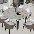 Round Marble Dining Table with Grey Chairs and Decorative Vase Fruit Cups in Modern Kitchen