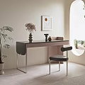 Modern Desk With Metal Frame Decorative Vases Artwork And Natural Light