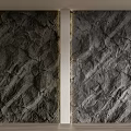 Textured Rock Background Wall With Vertical Divider And Warm Lighting On Wooden Floor