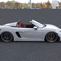White Convertible Sports Car With Red Interior And Sleek Design