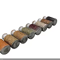Transparent Glass Spice Jars with Cork Stoppers Holding Various Colored Legumes Neatly on Grey Background