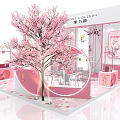 Pink Themed Exhibition Booth With Cherry Blossom Tree Tables Chairs And Decorations