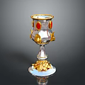Elegant Decorative Cup With Silver Body Gold Accents Red Gemstones And Leaf Base