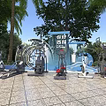 Outdoor Sports Equipment In Open Air Fitness Area With Trees And Palm Trees
