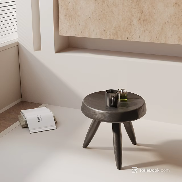 Modern Round Black Coffee Table With Three Legs Mug And Books On Light Floor 3d model 