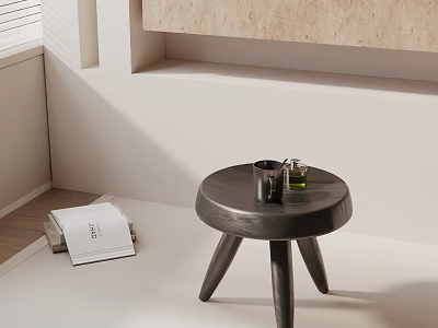 Modern Round Black Coffee Table With Three Legs Mug And Books On Light Floor 3d model