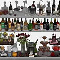 Assorted Wine Bottles and Cocktail Glasses Display with Floral Arrangements and Fresh Fruits