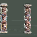 Two Colorful Traditional Totem Poles With Carved Human Faces And Ornate Tops