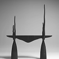Modern Artistic Black Bar Counter Design With Tall Slender Supports And Unique Sculptural Base