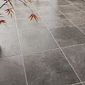 Gray Square Floor Tiles In Modern Interior With Decorative Vase And Brown Leaves
