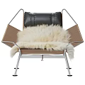 Modern Lounge Chair With Metal Frame Brown Cushion White Fur Pad And Black Pillow