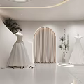Modern Bridal Shop Interior Design With Two Wedding Dresses And Plants