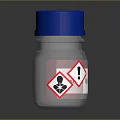 Transparent Glass Bottle With Blue Cap And Warning Hazard Symbols For Household Use